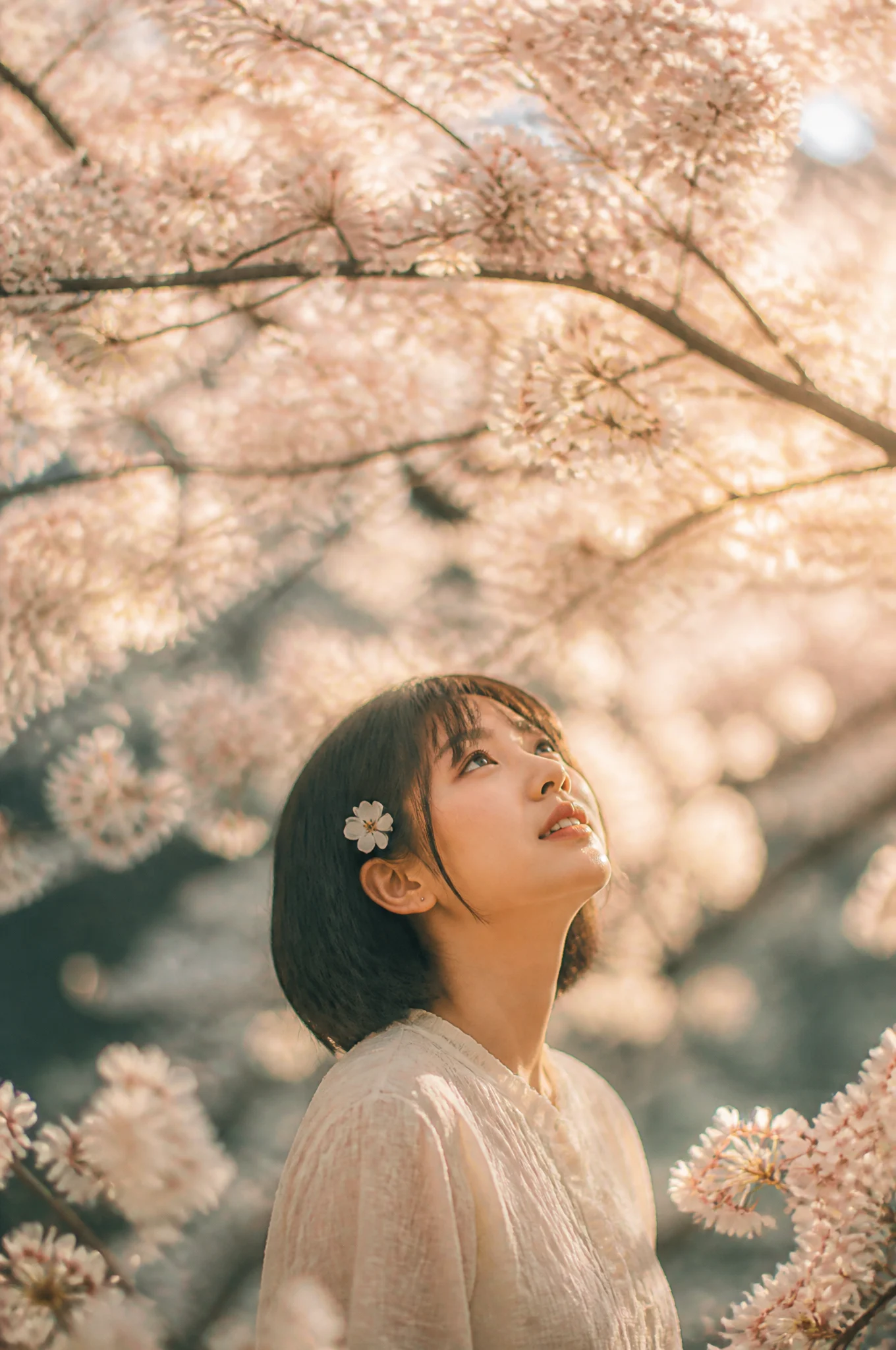 PROMPT : A cinematic portrait of a young East Asian woman...